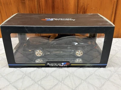 1:18 1985 Camaro Iroc-Z negro y dorado por modelo diecast Sunstar Foto 1 de 4