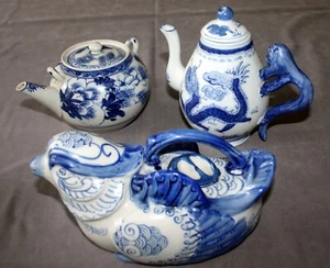 3 Blue & White Porcelain tea pots W/Lids, Dragon w/Foo Dog Handle/ Floral/ Bird - Picture 1 of 12
