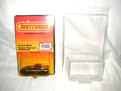 Mazda RX7 1982 Matchbox #31 MIP, negro con rayas blancas/doradas RX7 en paquete Protecto Foto 1 de 4