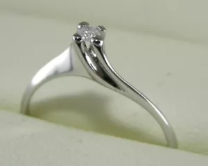 Anello solitario in oro bianco 18kt. con diamante da ct. 0.08 L.G. garanzia - Foto 1 di 3