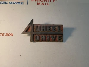 JEEP WAGONEER/J-SERIES 1960's 4 WHEEL DRIVE FRONT FENDER EMBLEM - Picture 1 of 2