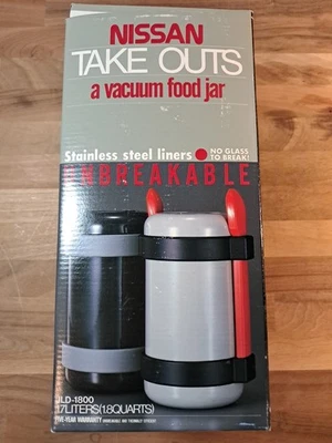 Tarro de comida al vacío Nissan completo con correa dos cuencos y cuchara caja nueva abierta Foto 1 de 4