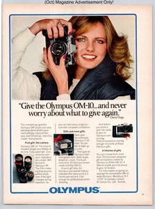 Olympus OM-10 Cheryl Tiegs Camera Lenses Flash Photography 1981 Advertisement - Picture 1 of 5