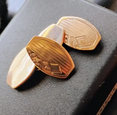 Gemelos de oro AAGCO Foto 1 de 2