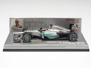 MINICHAMPS 1:43 MERCEDES W03 M. SCHUMACHER 300th GP BELGIUM GP 2012 Nr.49 - Picture 1 of 4