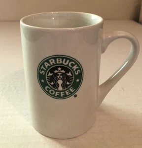 Taza de café Starbucks 2008 cerámica blanca 10 oz logotipo verde sirena coleccionistas - Imagen 1 de 8