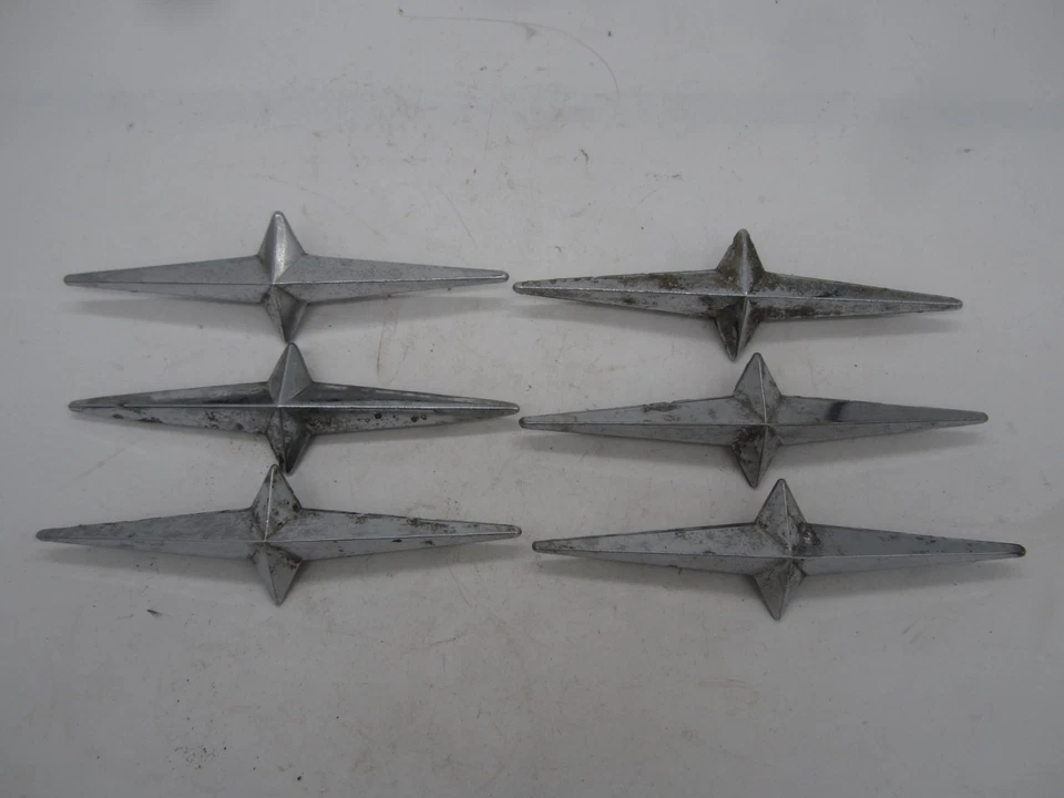 54-58 Pontiac Catalina Star Chief Chieftain Cromo Estrella Emblema Lote de 6 USADOS Foto 1 de 2