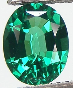 2.47CT. EXCELLENT CUT OVAL 10x8 MM. LAB CREATED NANOCRYSTAL EMERALD - Picture 1 of 3