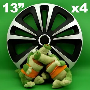 TAPACUBOS 13" Terra 4 PIEZAS PLATA + negro para DAEWOO LANOS NEXIA FIAT SEICENTO - Imagen 1 de 1