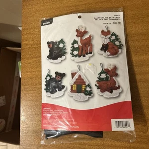 Bucilla Felt Applique 6 Piece Ornament Kit, 4"X5", Santa Black Bear Cabin - Picture 1 of 3