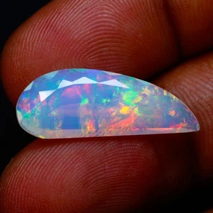 5.29Ct Pear 26.36 x 9.93 x 4.83 MM Dancing Multi Colors Rainbow Fire Opal - Picture 1 of 5