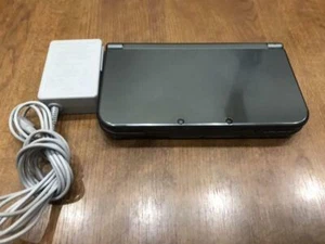 New Nintendo 3DS LL Metallic Schwarz AC Chenger GEBRAUCHT - Bild 1 von 3