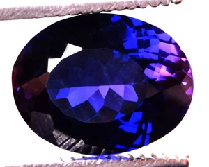 15,05 cts. Natürliche lila Wirbelsäule ovale Form zertifizierter Edelstein - Bild 1 von 4