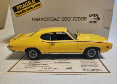 Danbury Mint 1969 Pontiac GTO Judge Goldenrod Yellow 1/24 - Image 1 of 4