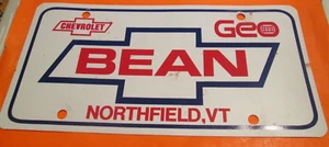 VTG BEAN CHEVROLET GEO Car Dealership PLASTIC License Plate Tag NORTHFIELD VT - Picture 1 of 1