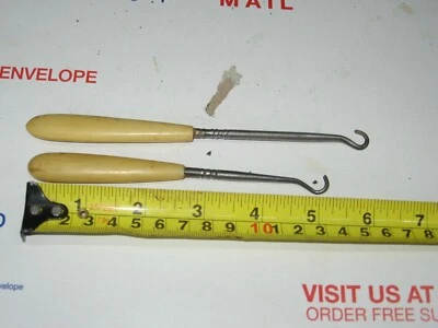 ANTIQUE SHOE LACE HOOKS WITH IVORY HANDLES {2} 5 1/4" and 6 1/2" - Image 1 of 3