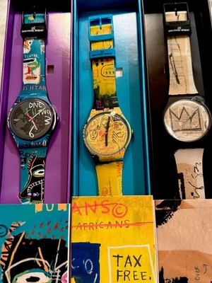 3 RELOJ X JEAN-MICHEL BASQUIAT Art Journey Edición Limitada SUOZ354,55,56   Foto 1 de 4