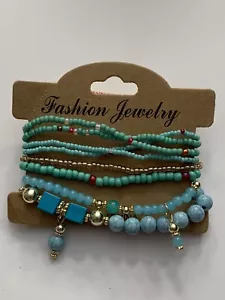 8 PC STRETCHABLE BRACELETS IN BLUE TONES-B52500 - Picture 1 of 3