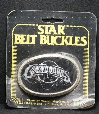 WJ15170 *NOS* COOL VINTAGE 1970s **COMMODORES** ROCK BAND MUSIC MENS BELT BUCKLE - Image 1 of 2