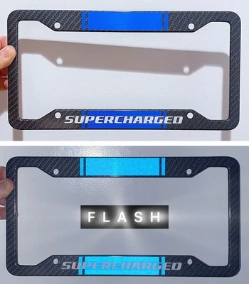 Reflective Blue Supercharged Metal Carbon Fiber Look License Plate Frame - Image 1 of 4