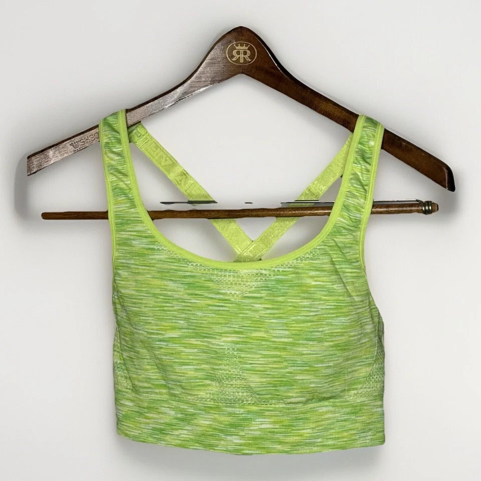 Sujetador deportivo FILA para mujer talla XL verde y amarillo estampado de tinte espacial soporte medio Foto 1 de 4