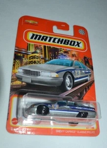 MATCHBOX 2022 CITY ADVENTURE 67/100 - '94 CHEVY CAPRICE POLICÍA CLÁSICA PLATA - Imagen 1 de 6