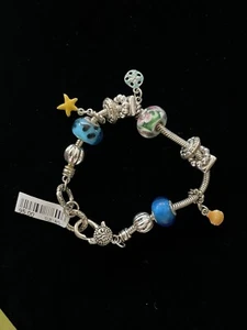 EUROPEAN SILVER 8” BRACELET AND BLUE 13 total CHARMS $95. - Picture 1 of 5
