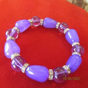 NUEVO Agradable Pulsera de Cristal PÚRPURA RETRÁCTIL Talla Única Se Adapta a Todos - Imagen 1 de 5