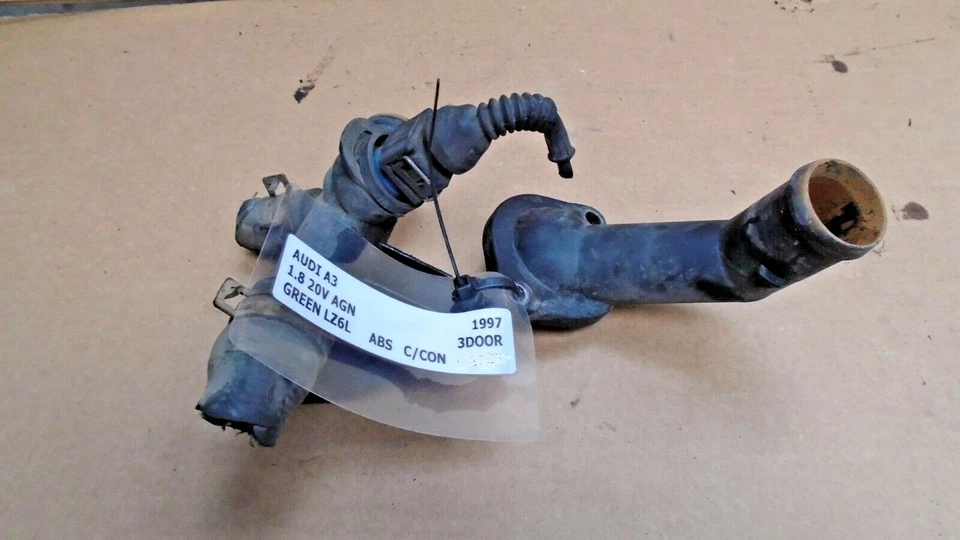 CARCASA TERMOSTATO AUDI A3 1997 1.8 20V Y BRIDA AGUA 06A121121C,06A121133C Foto 1 de 1
