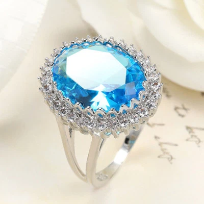 Preciosos anillos de plata naturales brillantes con topacio azul océano titanio talla 6-10 Foto 1 de 4