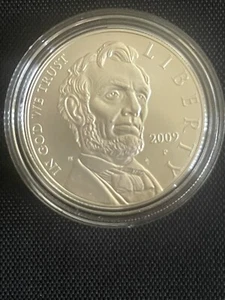 2009 Abraham Lincoln Commemorative Uncirculated Silver Dollar Coin Set And COA - Picture 1 of 3
