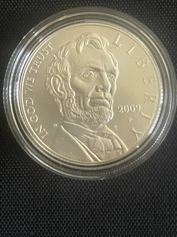 2009 Abraham Lincoln Commemorative Uncirculated Silver Dollar Coin Set And COA Cover