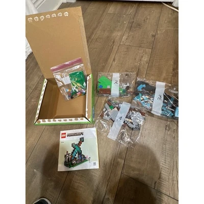 LEGO Minecraft The Illager Raid Building Set 21244 Kids Toy partially opened - Image 1 of 4