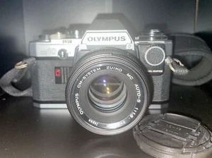 Olympus OM10 reflex 35 mm con adattatore manuale - Foto 1 di 4