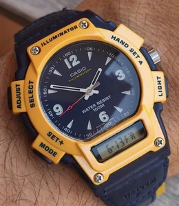 Orologio Casio AQ-150W Illuminator Vintage Yellow Blue Ana Digit - Picture 1 of 20