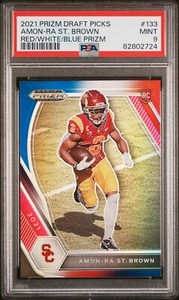 2021 Panini Prizm Draft Picks 133 AMON-RA ST BROWN Red White Blue PRIZM PSA 9 RC