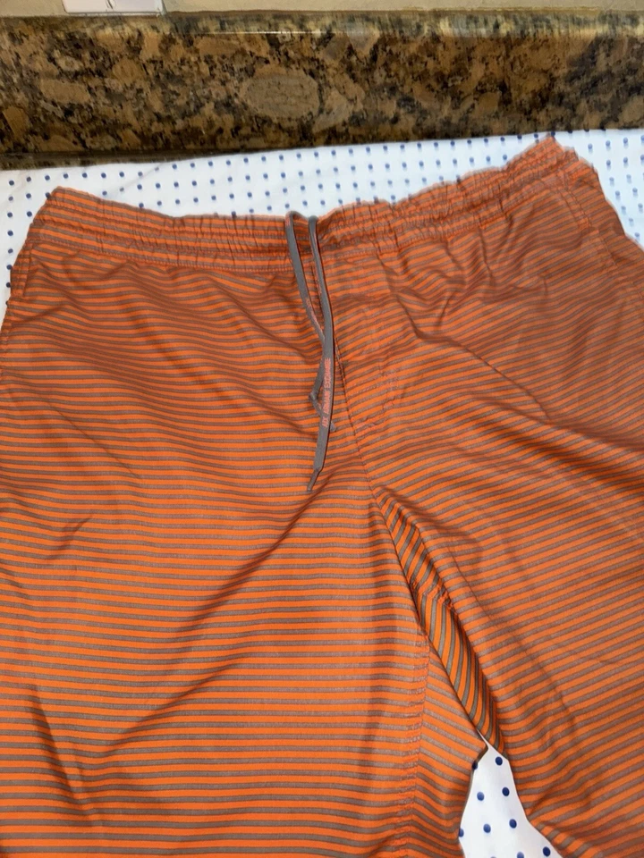 Bañador Armani Exchange Hombre Talla Grande Rayas Naranja y Gris Logo AX. Foto 1 de 4