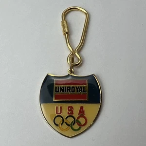 Portachiavi vintage a forma di scudo Uniroyal Olimpiadi USA - Foto 1 di 9
