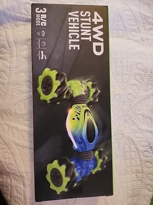 Vehículo de acrobacias 4x4 coche de control remoto con sensor de gravedad amarillo Foto 1 de 2