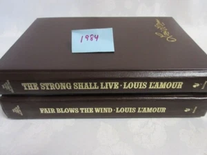 2 Louis L'Amour Leatherette Book: THE STRONG SHALL WE LIVE & FAIR BLOWS THE WIND - Picture 1 of 14