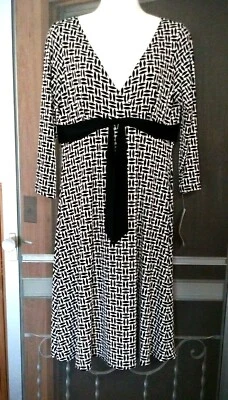 NUEVO VESTIDO MUJER MAGGY LONDON NEGRO Y MARFIL ESTAMPADO MANGA 3/4 12 PRECIO DE VENTA SUGERIDO POR EL FABRICANTE 108 $ NUEVO CON ETIQUETAS Foto 1 de 4