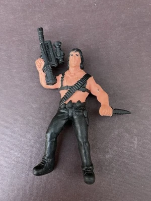 Figura borradora de goma Arco Rambo 1986 vintage - Stallone con cuchillo y rifle Foto 1 de 2