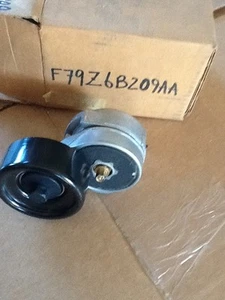 NOS Ford Idler Tension Pulley. F79Z6B209AA - Picture 1 of 2