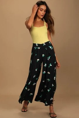 Pantalones de pierna ancha Billabong Wandering Soul negros con estampado floral  Foto 1 de 4