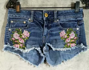 Pantaloncini jeans denim American Eagle donna 00 blu floreali tagliati con stivali - Foto 1 di 10