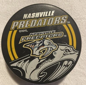 NASHVILLE PREDATORS Official Hockey Puck NHL- In Glas Co - Made in Slovakia - Picture 1 of 4