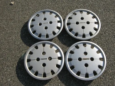 Tapacubos originales 1984 a 1987 Mazda 626 14 pulgadas cubiertas de rueda 716781-0010 Foto 1 de 4