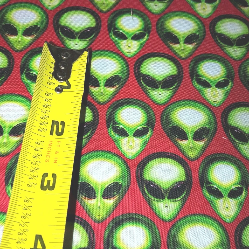 RK Area 51 Alien faces on red 100% cotton fabric by the yard - Flame 19547-101 - Image 1 of 4