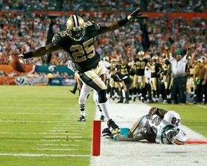 REGGIE BUSH 8X10 PHOTO NEW ORLEANS SAINTS PICTURE NFL FOOTBALL VS DOLPHINS - Picture 1 of 1