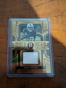 2023 Panini Gold Standard #GG-JJA Josh Jacobs Gold Gear Patch #'d /299